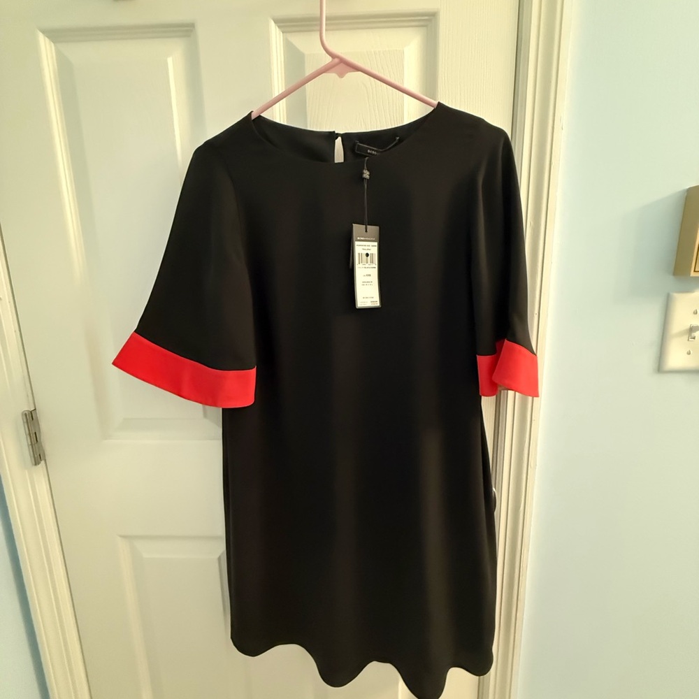 Elegant Black Dress with Red Accents